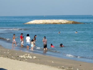 Playing beachside