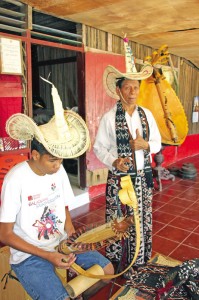 Jeremias and his grown son Berto on the electric sasando biola