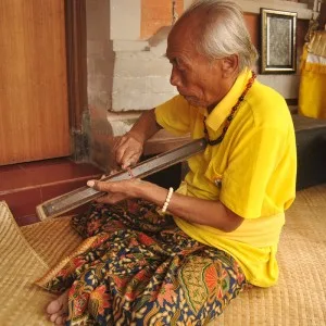 Ketut Liyer Opening a Lontar Ketut Liyer Opening a Lontar
