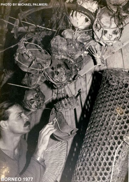 Michael with trophy skulls in Borneo 1977