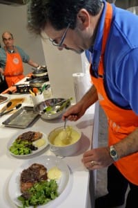 Finishing touches on filet mignon dinner