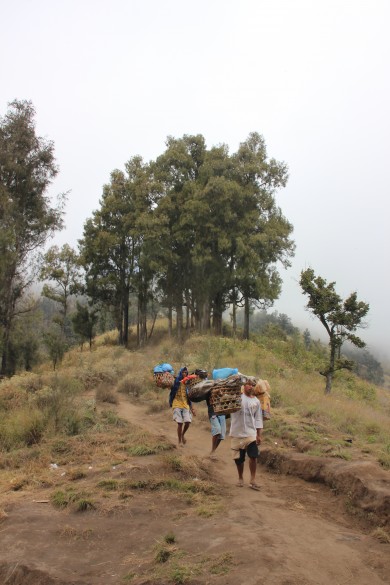 Locals Carrying Garbage