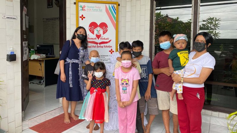 Kids receiving donations from Hotel Nikko Bali