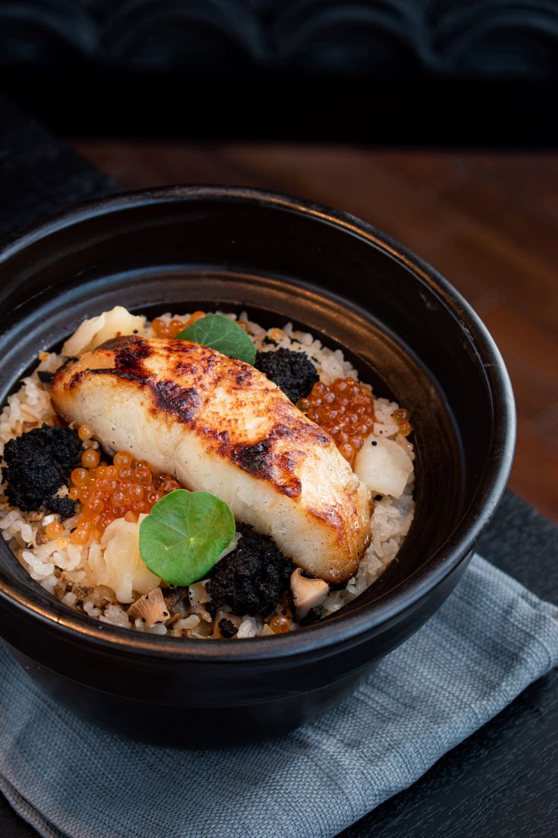 Signature cod fish, scallops, black truffle, claypot rice