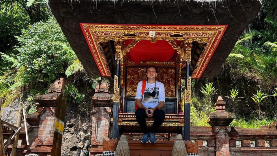 foreigner sitting in a sacred temple