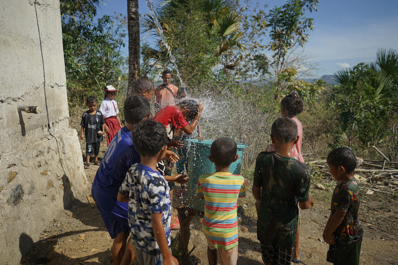 The people in Tafuli Village rejoiced over the first water flowing into their village