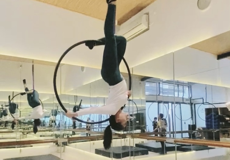 "In Omnia Paratus": The Strength and Grace of Aerial Hoop