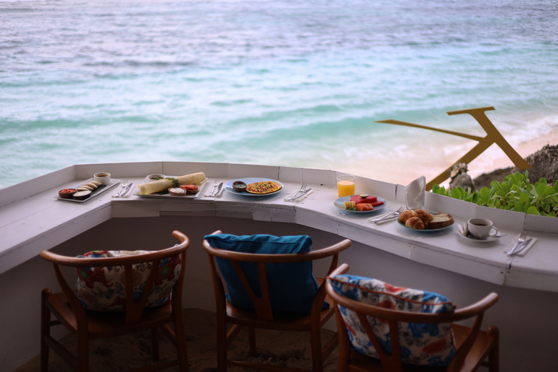 Enjoying the Tasty Food with a Beachfront View