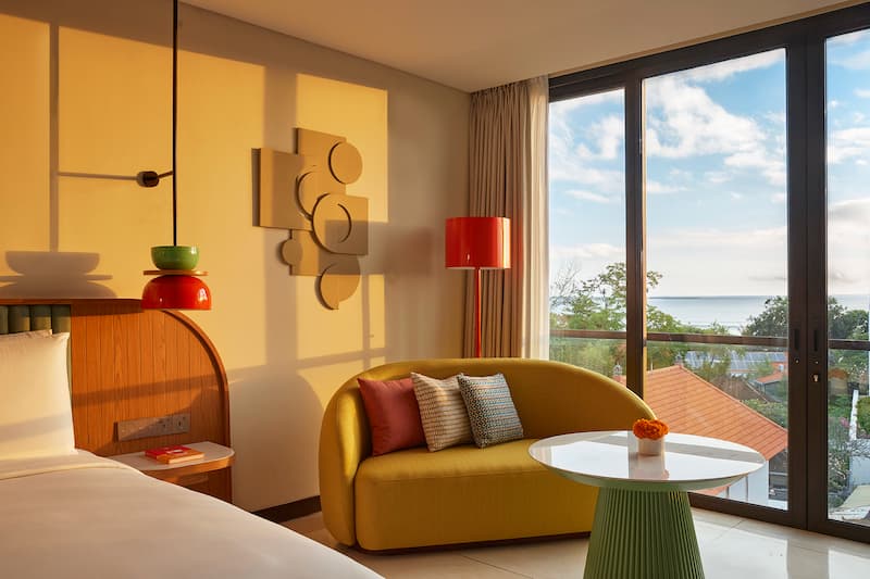 KLEO Seminyak room featuring a sleek yet nuanced mid-century modern aesthetic.