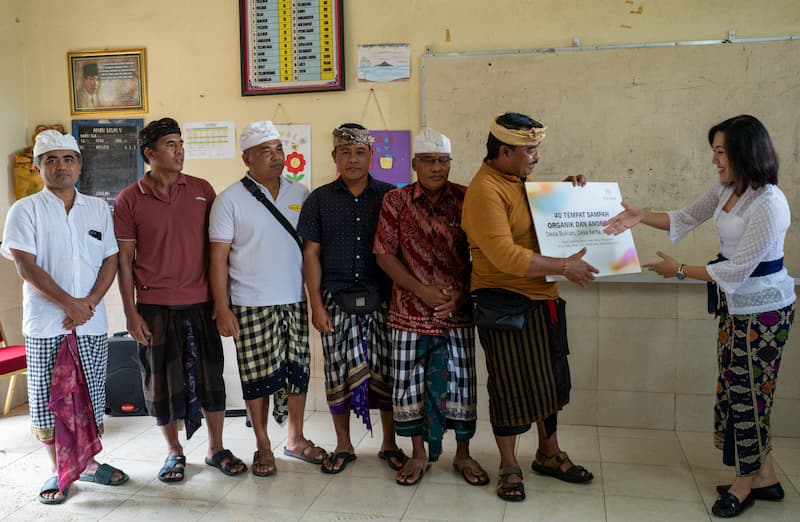 Padma Hotels’ Kristanti Tannady presents the donation to support local impact