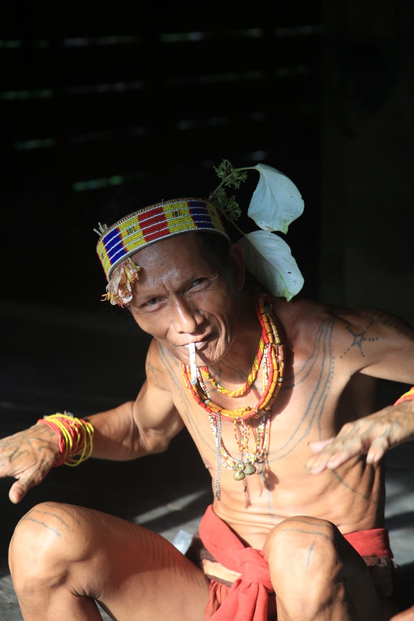 A Mentawai elder acting like a bird
