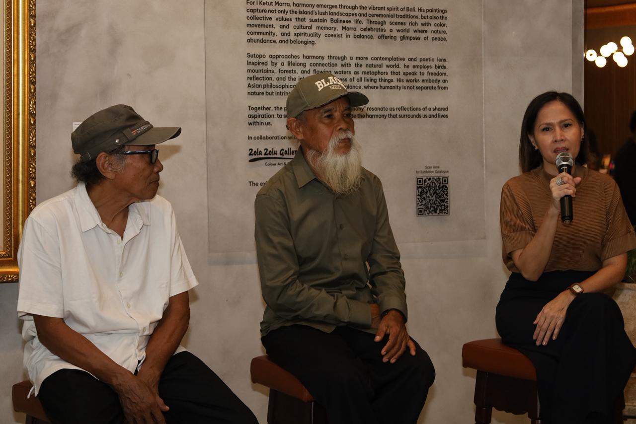 Sutopo (white shirt) and I Ketut Marra (dark grey shirt)