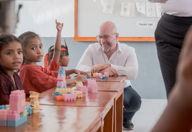 Mr. Joncas with the Children